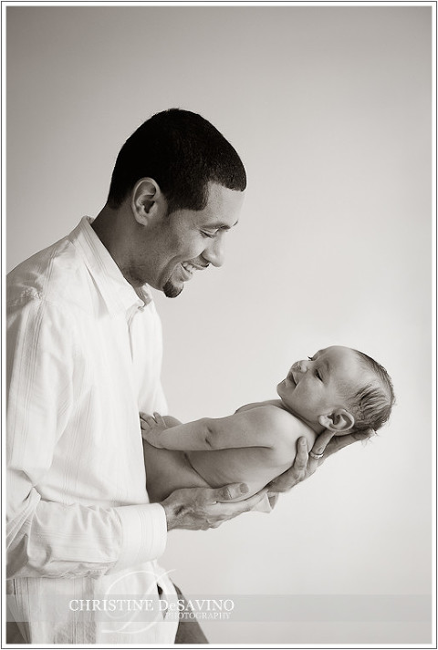 Father smiles at his baby boy - New Jersey Family Photographer